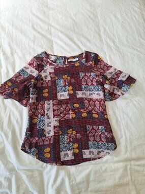 Ricki's Red, blue, mustard, pink short sleeve ruffle shirt